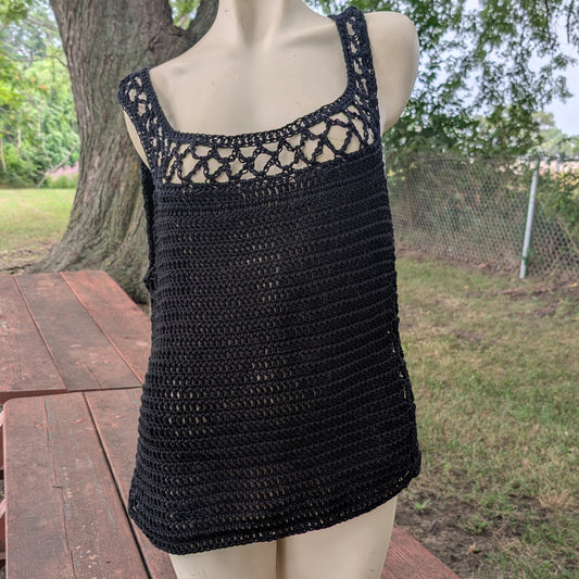 Charcoal open-mesh handmade crochet top on a mannequin
